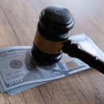 What is the smallest amount of money you can sue for in small claims court with gavel and cash