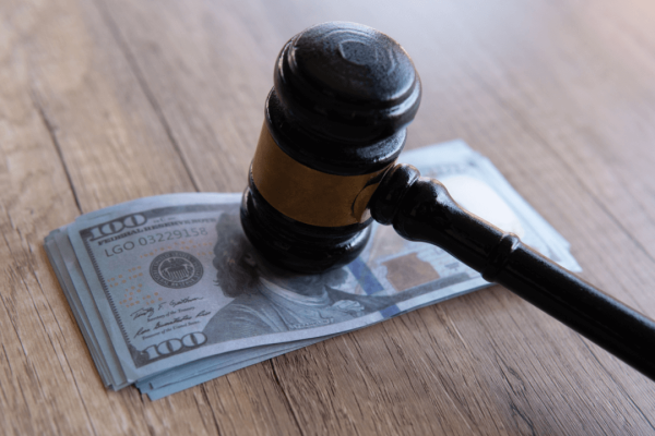 What is the smallest amount of money you can sue for in small claims court with gavel and cash