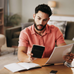 Man reviewing debt collection letters learning what is the 7 7 7 rule for collections