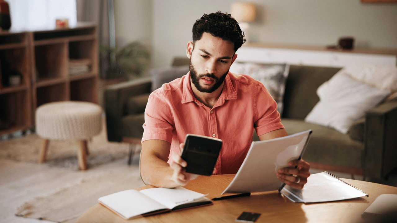 Man reviewing debt collection letters learning what is the 7 7 7 rule for collections
