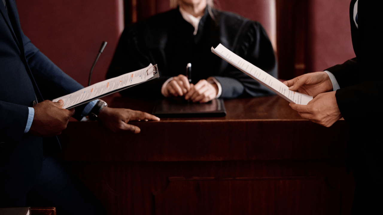 What is the role of a criminal defense lawyer in courtroom proceedings with judge and attorneys