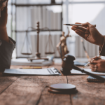 Why would you try to negotiate a settlement instead of going to court - attorneys discussing legal agreement