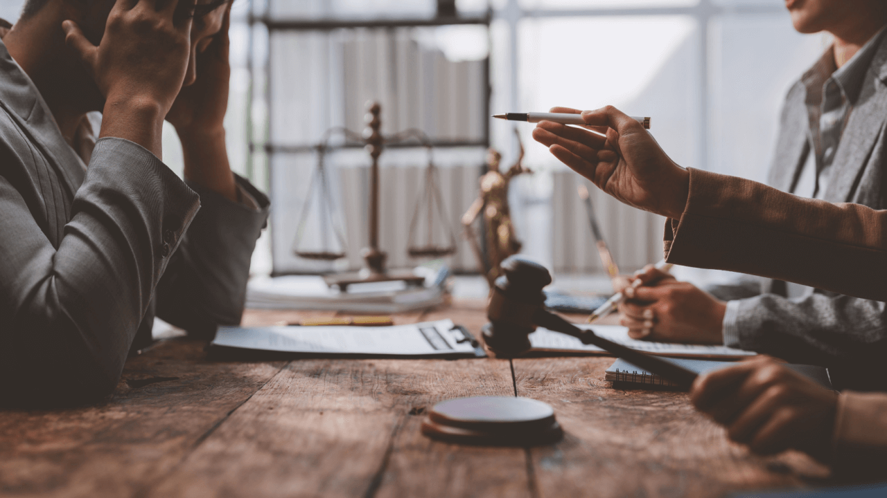 Why would you try to negotiate a settlement instead of going to court - attorneys discussing legal agreement