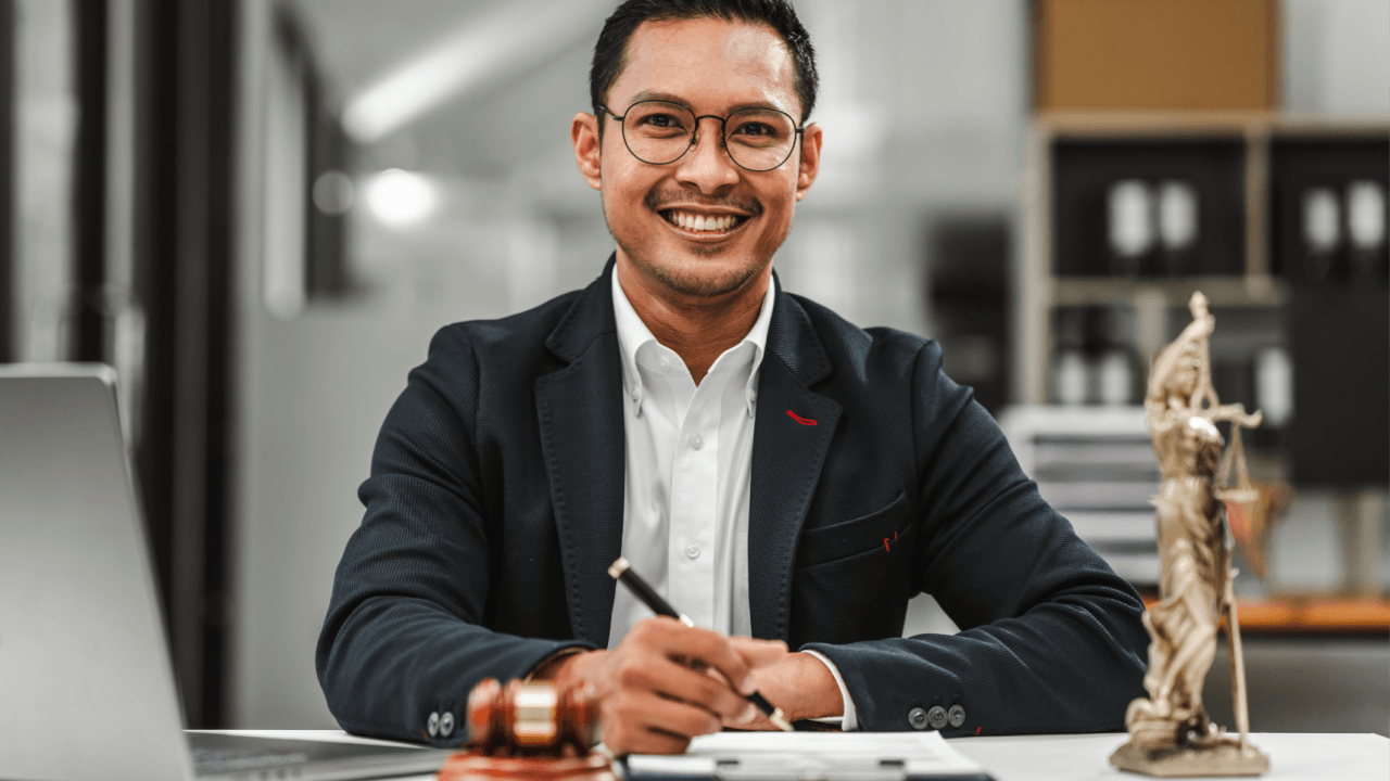 How criminal defense attorneys work - lawyer preparing case documents at office desk