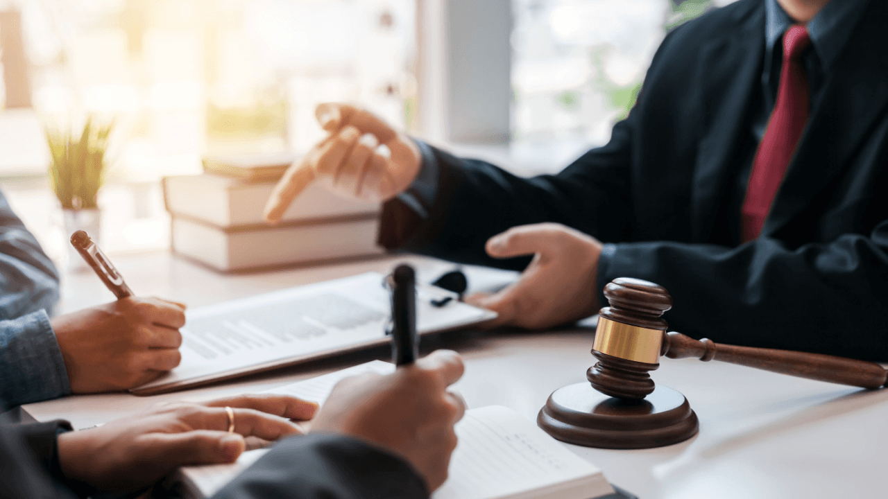 Criminal defense lawyer helping client understand how does a criminal defense lawyer help me during legal consultation