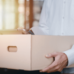 Employee carrying a box after being wrongfully terminated