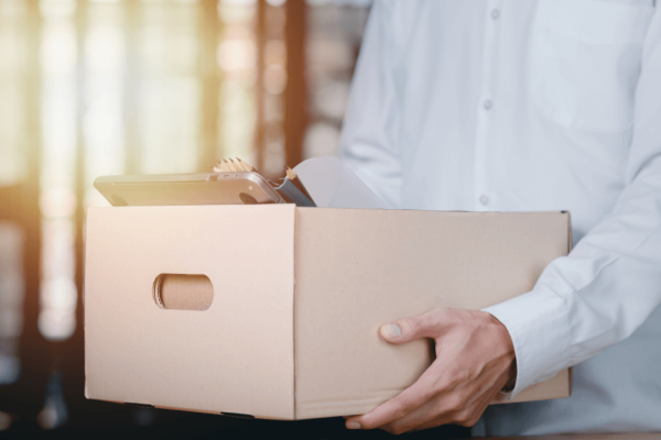 Employee carrying a box after being wrongfully terminated