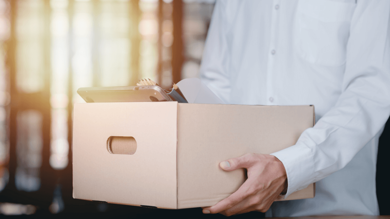 Employee carrying a box after being wrongfully terminated