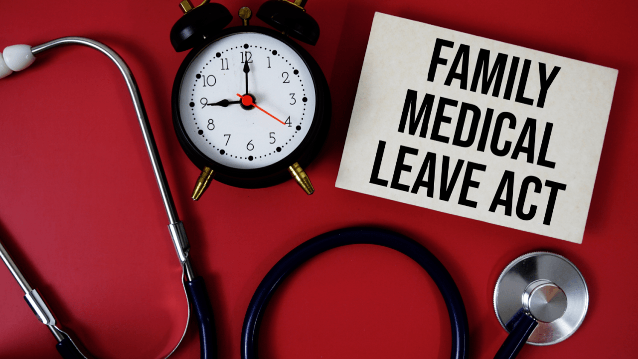 Family Medical Leave Act sign with clock and stethoscope showing can you be fired while on FMLA leave