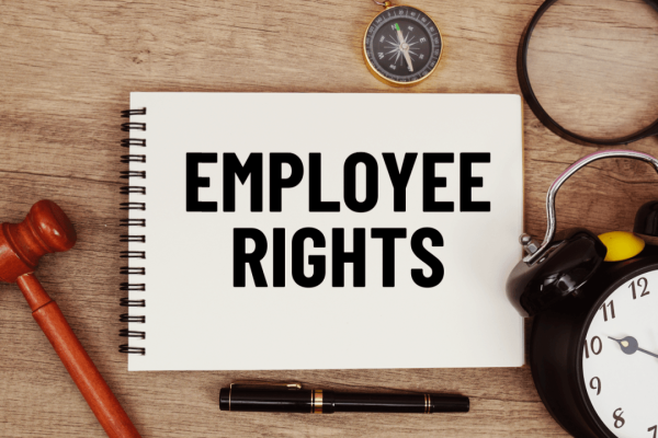Employee rights notebook with gavel and clock representing intermittent FMLA leave employee rights