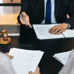 Attorney explaining what creates a hostile work environment during legal consultation with client